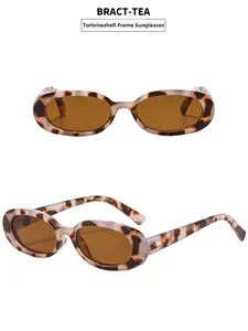 Detail of vintage oval leopard print sunglasses with brown lenses and leopard texture