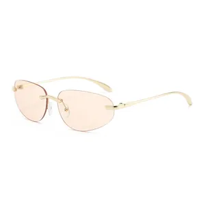 Y2K Randlose Sonnenbrille mit orangen Tropfengläsern und goldenem Metallrahmen für Damen