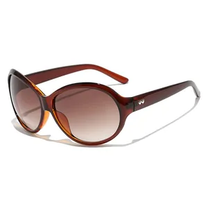 Fashion oversized amber sunglasses with brown gradient lenses and heart metal decor