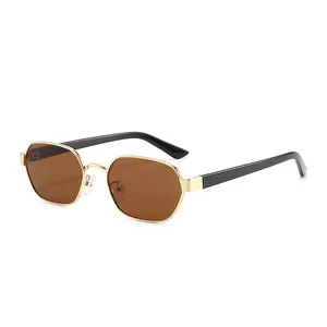 Chic polygonal gold metal frame sunglasses with dark brown lenses and black temples