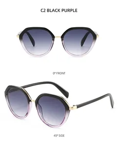 Close-up of hexagonal gradient black and purple sunglasses with gold metal accents