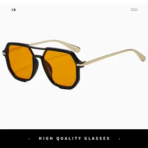 Close-up of stylish square aviator sunglasses with orange lenses and gold double bridge