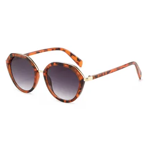 Chic polygon tortoise shell sunglasses with gradient lenses and gold metal accents