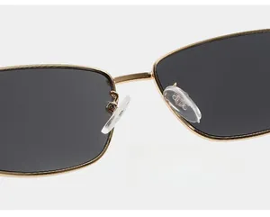 Macro detail of comfortable silicone nose pads on square metal frame sunglasses