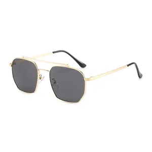 Modern double bridge polygonal metal sunglasses with gold frame and dark gray lenses