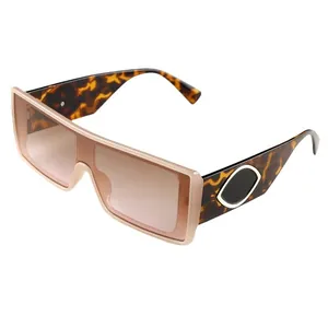 Square fashion sunglasses with translucent pink frame and tortoiseshell temples