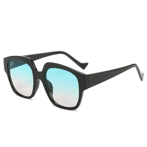 Stylish square oversized sunglasses with black frames and blue-pink gradient lenses