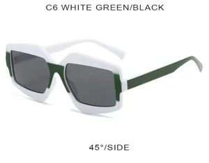 Vue latérale à 45 degrés des lunettes de soleil tendance à monture blanche et verte