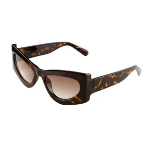Retro tortoiseshell cat-eye sunglasses with brown gradient lenses shown in a 45-degree angle