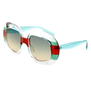 Retro oversized zonnebril met transparant montuur en klassieke groen-rood-groene strepen