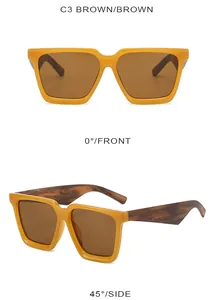 Front- und Seitenansicht der quadratischen Sonnenbrille in Ingwergelb mit dunklen Bügeln