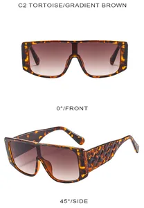 Detail view of tortoiseshell oversized sunglasses with quilted texture on temples