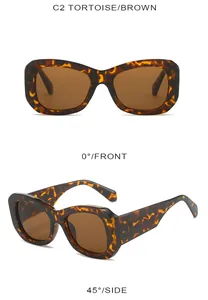 Detail view of modern tortoise sunglasses with brown lenses and bamboo pattern temples