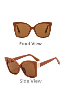 Detailed views of amber brown cat-eye sunglasses with golden metal hinge accents