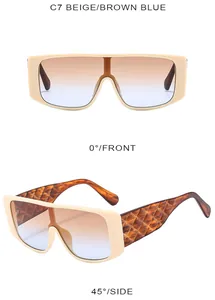 Detailed view of oversized beige sunglasses with gradient lenses and quilted temples