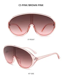 Front- und Seitenansicht der pinken Oversize-Shield-Sonnenbrille mit Verlaufsgläsern