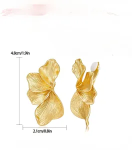 Detail of gold petal earrings with clip-on back and dimensions 4.8cm by 2.1cm