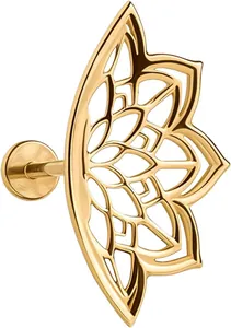 Detailed view of a gold mandala lotus labret stud with intricate hollow geometric patterns