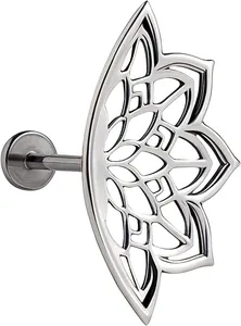 Macro shot of silver polished lotus flower stud earring with surgical steel post
