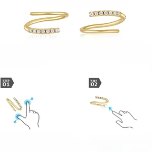 Gold spiral cartilage hoop earrings with cubic zirconia stones and wearing instructions