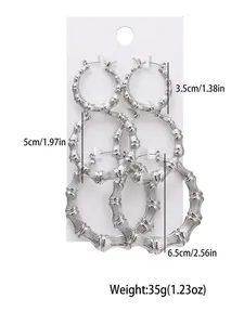 Three pairs of bamboo-style hoop earrings in silver finish showing 3.5, 5, and 6.5 cm sizes