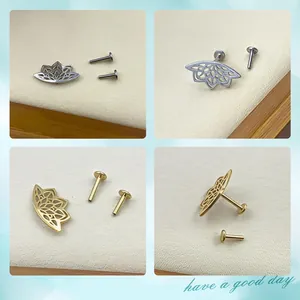Detailed views of gold and silver lotus flower ear studs with screw-back design