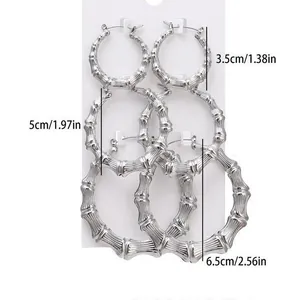 Three-pair set of silver bamboo-style hoop earrings in graduated sizes for women