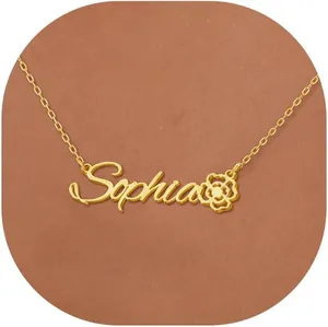 Close-up of personalized gold name necklace with Sophia script and floral detail