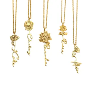 Customized gold name necklaces featuring integrated flower designs with delicate link chains