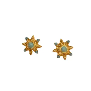 Golden sunburst stud earrings with turquoise stones in bohemian vintage style