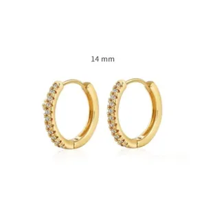 Detailed macro view of 14mm gold-plated hoop earrings with micro-set cubic zirconia stones