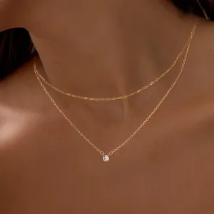 Double-layered gold-plated necklace with sparkling round zircon pendant for women
