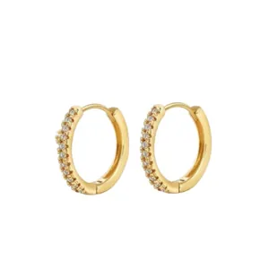 Set of four gold-plated brass hoop earrings with minimalist zircon inlay on white background
