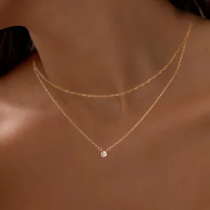 Double layered gold plated necklace with minimalist choker and zircon pendant for women