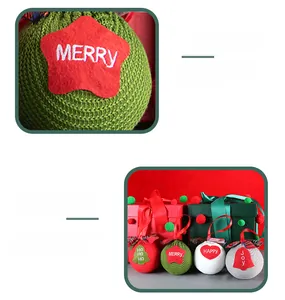 Detail of knitted Christmas tree ornaments with festive embroidery and red plaid bows