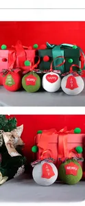 Detailed close-up of knitted Christmas ornaments with Merry and Happy holiday text embroidery