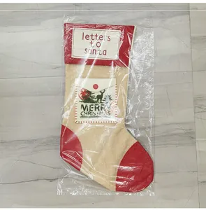 Detail of Christmas stocking with Letters to Santa print and reindeer envelope pocket