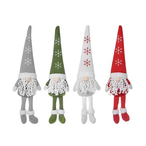 Set of four Nordic Christmas gnomes with knitted snowflake hats and long legs