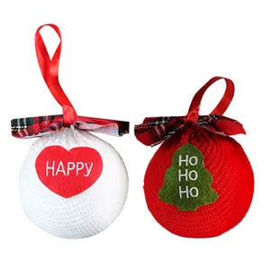 Knitted Christmas hanging balls set with festive embroidery and red plaid bows