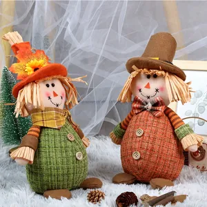 Detail of harvest scarecrow gnomes with maple leaf decor on a cozy textured surface