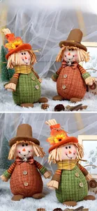 Detail of harvest gnomes with tweed fabric, maple leaves and straw hats decorations