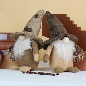 Duo von Plüsch-Kaffeegnome mit braunen Hüten, weißen Bärten und Mini-Kaffeebohnensäcken