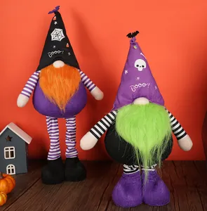 Macro detail of Halloween gnomes featuring spider web patterns and Booo text prints