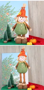 Detail of telescopic sunflower doll with maple leaf and knitted elements for Thanksgiving