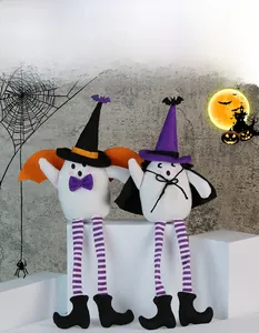 Detail of Halloween ghost plush dolls with wizard hats, long legs and colorful wings