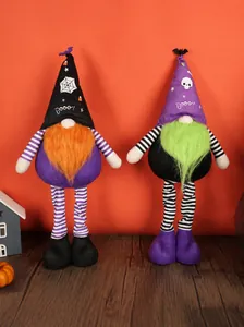 Macro detail of Halloween telescopic gnomes with spider web and skull patterns on tall hats