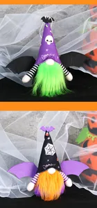 Detail of plush Halloween gnomes with bat wings and Booo slogans for party decor