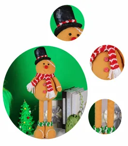 Detailed close-up of Christmas gingerbread man plush doll with top hat and striped scarf