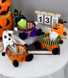 Detail of Halloween gnome candy baskets featuring pumpkin, black cat and ghost doll designs
