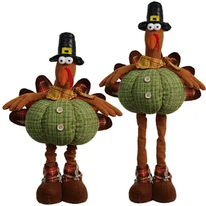 Set of two Thanksgiving turkey plush dolls with pumpkin bodies and pilgrim hats for autumn decor